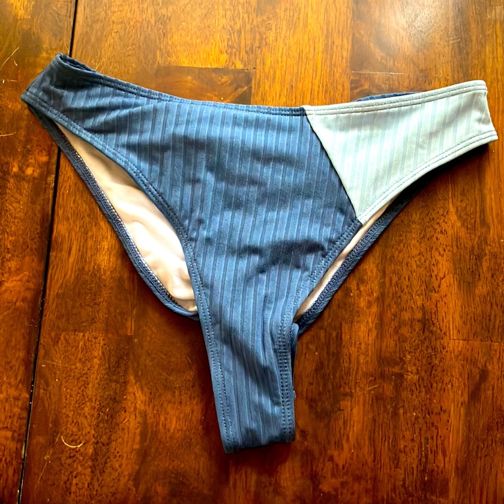 Bathing suit bottoms . Blue 2 toned . Cinched in the back